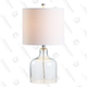 The transparent glass base of this lamp from Jonathan Y lets you see the power cord running up to the bulb, which is a unique look, if not for everyone.